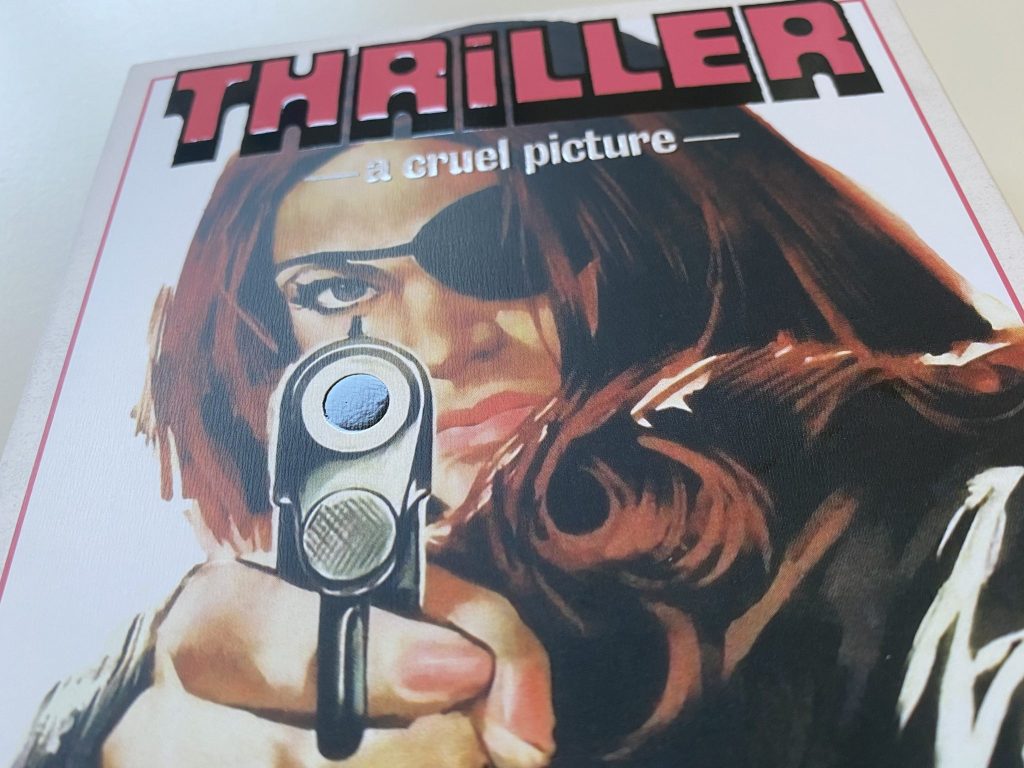 Detalle slipcover Thriller: A Cruel Picture
