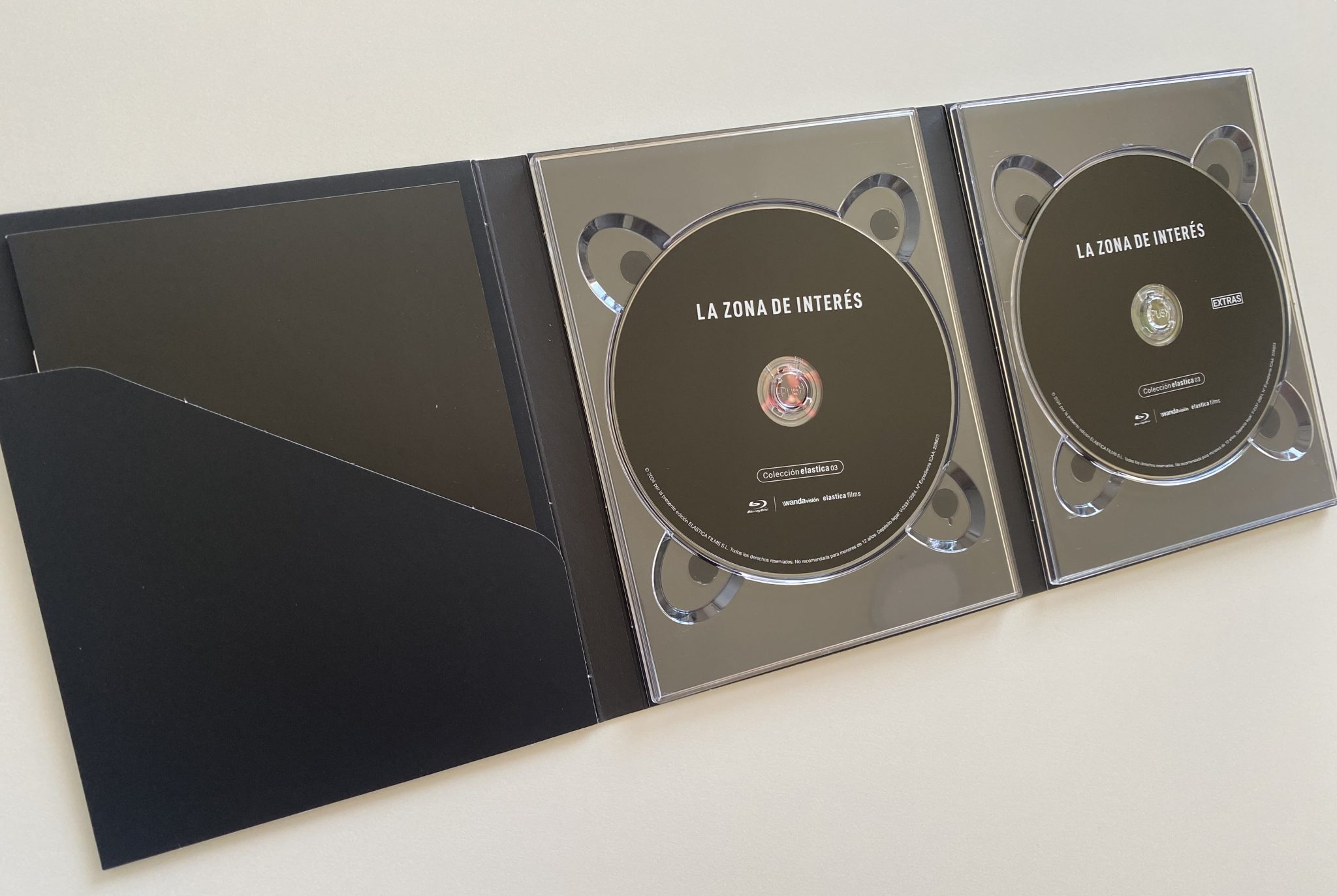 La zona de interés Blu-ray interior y discos digipack
