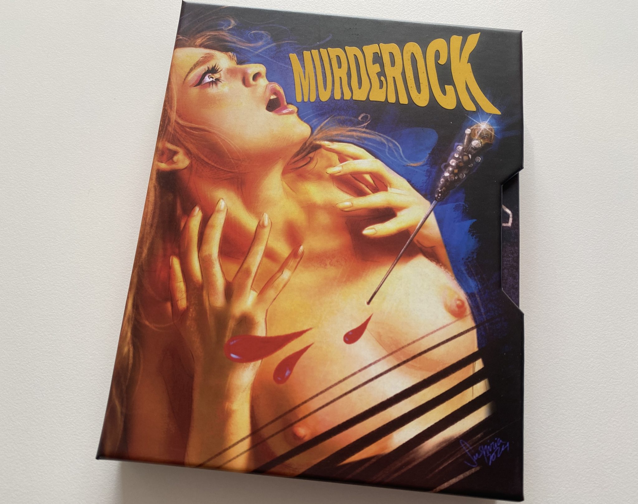 Murderock 4K Vinegar Syndrome - portada slipcase ladeada