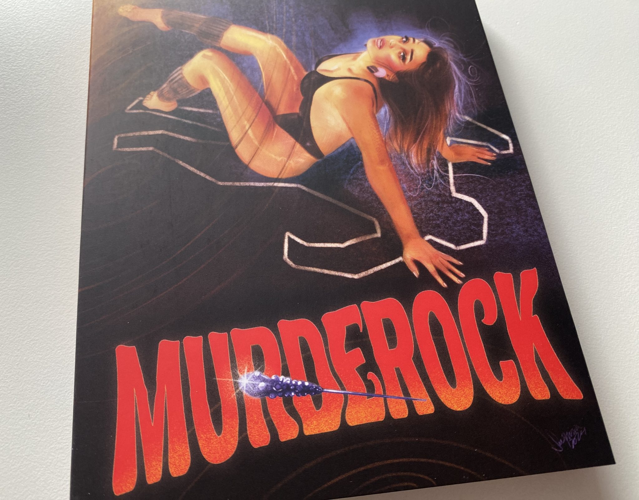 Murderock 4K Vinegar Syndrome - detalle portada slipcover