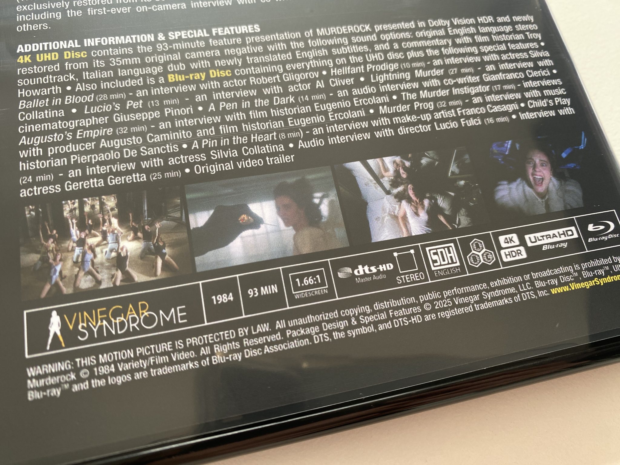 Murderock 4K Vinegar Syndrome - detalle contraportada amaray