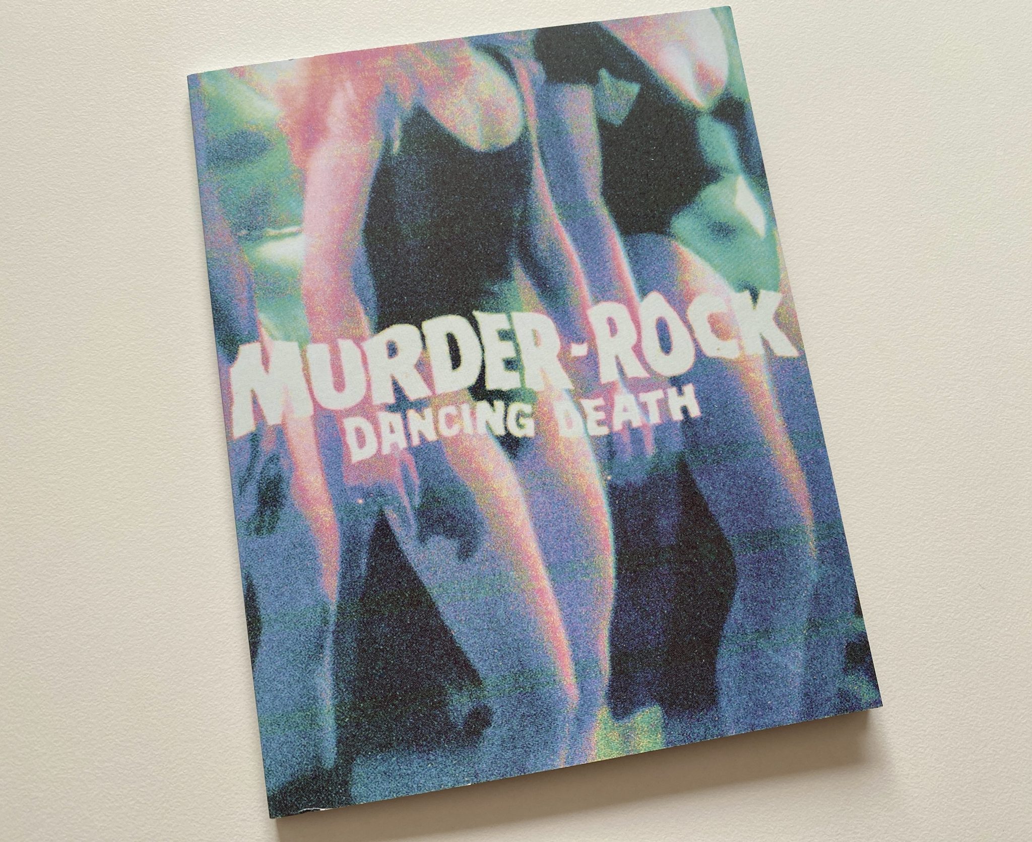 Murderock 4K Vinegar Syndrome - portada libreto